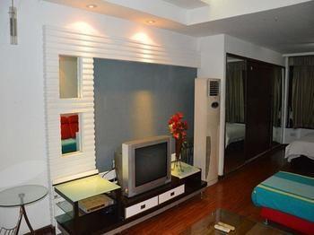 Yangguang Xingzuo Apartment Hotel Чунцин Екстериор снимка