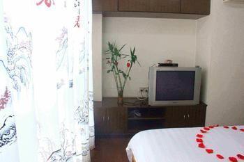 Yangguang Xingzuo Apartment Hotel Чунцин Екстериор снимка