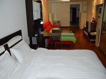 Yangguang Xingzuo Apartment Hotel Чунцин Екстериор снимка
