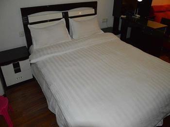 Yangguang Xingzuo Apartment Hotel Чунцин Екстериор снимка