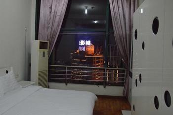 Yangguang Xingzuo Apartment Hotel Чунцин Екстериор снимка